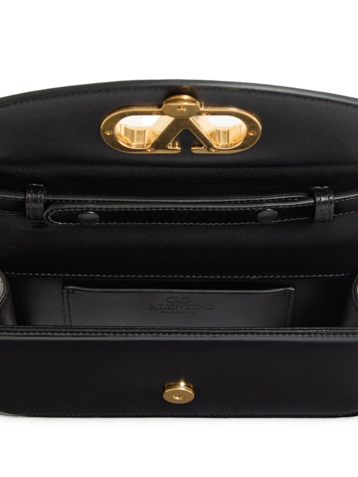 Valentino Garavani Vain small leather clutch