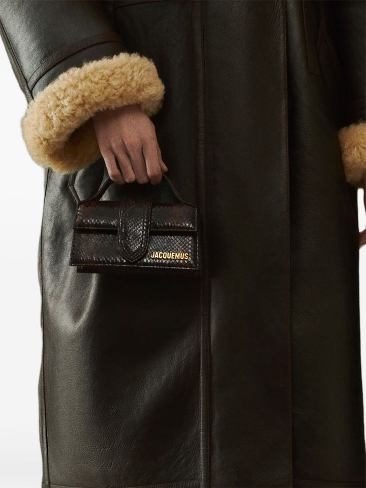 JACQUEMUS The Big Child Shoulder bag with flap.